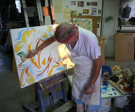 Tonnar applying oil paint to panel